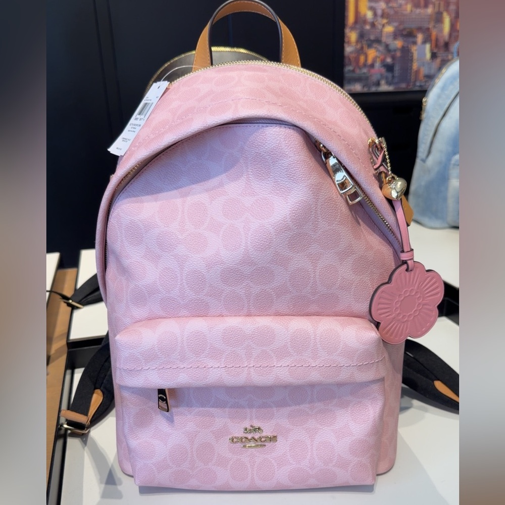 New  coach Taylor Small Backpack
In Signature Canvas With Charms powder pink